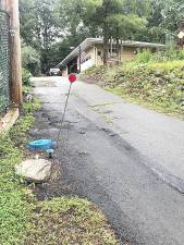 The water meter, on the street, is 100 feet away from the home of Arona Kohn and Alexander J. Takacs III (Photo provided)