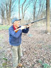 Ted Williams, shooting clay pigeons.