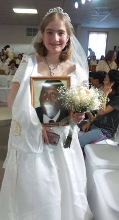 Gun-wielding couples renew their vows (Photo by Frances Ruth Harris)