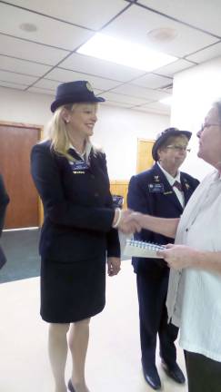 American Legion installs officers for the year to come Joan Kanavy, District Auxiliary President of the Wayne-Pike Auxiliary Council, congratulates Kelly Gaughan in her position as auxiliary historian