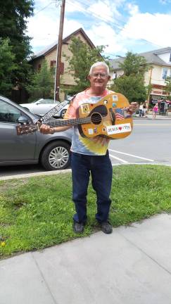 Raise your right hand — and strum Raise your right hand — and strum