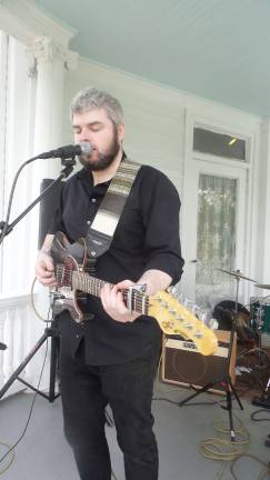 Milford gets fresh Cris Raabe of the Chris Raabe Band sings (Photo by Frances Ruth Harris)