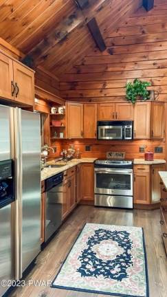 Modern and efficient log home nestled in the woods Modern and efficient log home nestled in the woods