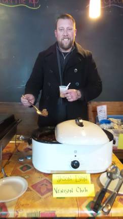Mac 'n cheese in wonderland Jason Lyon won first place for his venison chili (Photo by Frances Ruth Harris)