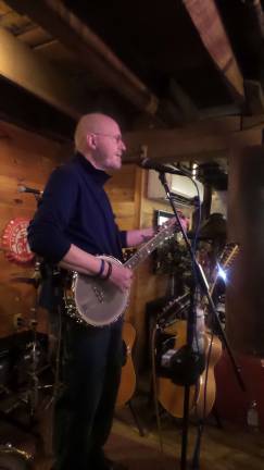 Bringing down the house Banjo music by Walt Edwards (Photo by Frances Ruth Harris)
