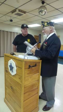 American Legion installs officers for the year to come Bill O'Hara receives an award for his devotion as cook over many years of service to the auxiliary