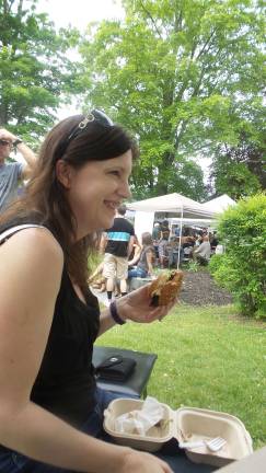 Milford gets fresh Karen Lawlor was one of many enjoying a “flirty burger,” a vegan speciality. She said it was simply the best. (Photo by Frances Ruth Harris)