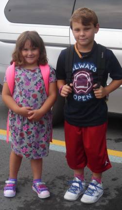 First-day butterflies Ava Galini, 5, with big brother Brendan Galini, 8
