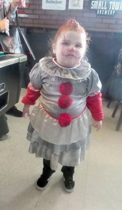 Fairy princesses mingle with ghastly ghouls at Trunk or Treat Juliette shows her colorful costume (Photo by Frances Ruth Harris)