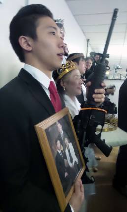 Gun-wielding couples renew their vows (Photo by Frances Ruth Harris)