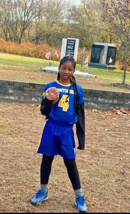 Girls on the field, ice, mat Jaelynn Monk, 10, plays running back in the Pike Area Youth Athletic League’s co-ed flag football program. (Photo by Jestin Monk)