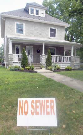 A no sewer sign in Milford (Photo by Frances Ruth Harris)