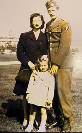 George M. Hickey with his wife Jose and daughter Bertha Ann at five years old.