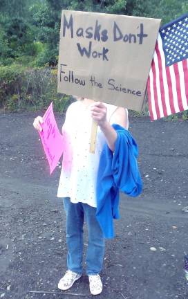 Some protestors concealed their faces from this photographer (Photo by Frances Ruth Harris)