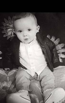 Oh Baby, it's Spring! Baby Photo Contest Photo, Daniel Doellinger of Chester Charlie in leather jacket at 5 months old.