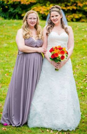 Mother Daughter Look A Like Contest Photo submitted by Shannon Knowlton of Sparta "Me and my Mom, Terri Burdett, before my wedding on October 19, 2013."