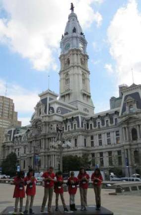 Hope for a better world Philly City Hall: Taking notes for this story while in front of the Philadelphia City Hall are Nuria Bary, Grace Lee, Jules Meeler, Stella Weir, Helaina Staniak, Isabella Anderson, and Trinity Long.