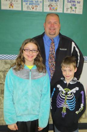 Top kids for January Band Students of the Month: Destinie Guard (Cadet Band), Kameron Allen (Beginning Band) with DVES Principal Aaron Weston.