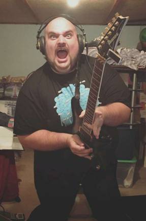 Guitarist Chuck Bungo, a college friend of Harrison's, in the studio (Photo provided)