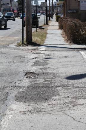Smoke shops do not bring prosperity Assessor Jane Drake said no tobacco store offered money for sidewalks in response to her solicitation. (Photo by Pamela Chergotis)