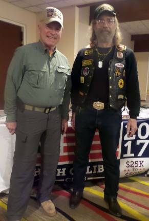 More guns means a safer society, dinner guests say Military veterans Rich Morholt and Tom Heying in the anteroom prior to the dinner (Photo by Frances Ruth Harris)