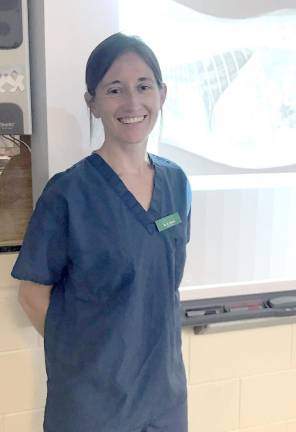Eighth-graders learn from the pros about the world of work Brittany Comisky, veterinarian
