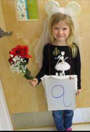 Kindergartners celebrate the union of 'Q' and 'U'! Bride Taryn Kaylor (Photo by Peggy Snure)