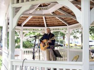 Singer Walt Edwards of Milford performs at Ann Street Park during a past Septemberfest (Photo by George Leroy Hunter)