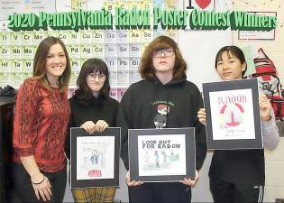 From left: Mrs. Jessica Gregorski; Anya Norwood, third-place winner; Brandon Maros-Moran, first-place winner; and Youngeun Eunice Choi, second-place winner.