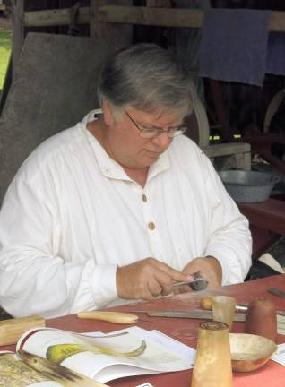 Learn about traditional crafts at Quiet Valley Living Historical Farm Horn artist Ed Weinhofer at work (Photo provided)