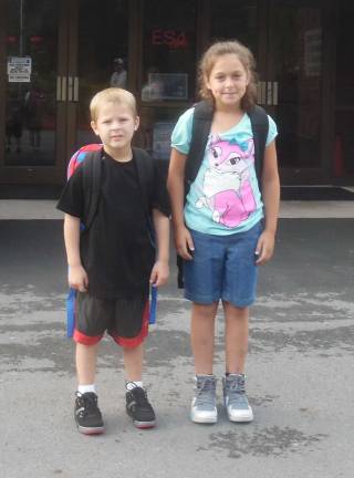 First-day butterflies Aaron Conklin, 5, with sister Julia Keller, 8