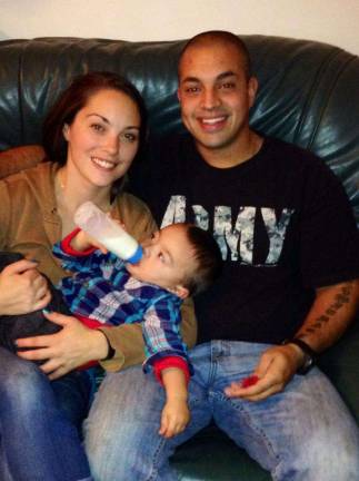 Couple offers free rides to prevent DUI deaths Jenna Dooley and Jeremy DeVito with their son, Caleb, age 1. (Photo by Anya Tikka)