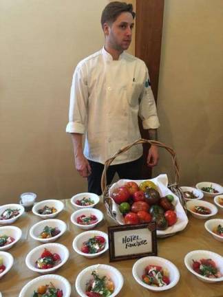 Milford Presents delivers bounty to food pantry Hotel Fauchere’s William Polatnick “Sharing the Harvest” with a locally harvested heirloom tomato salad (Photo provided)