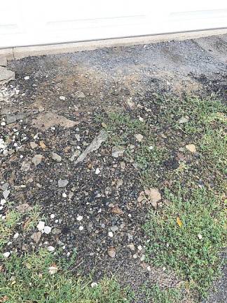 The water pipe that runs under the driveway at the home of Arona Kohn and Alexander J. Takacs III has been repaired many times, but the pavement is never restored (Photo provided)