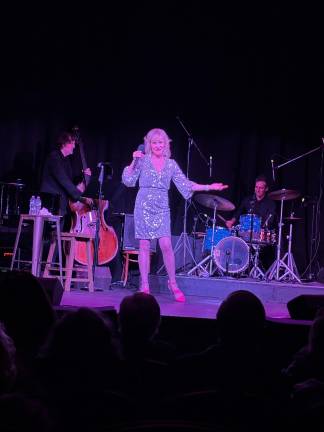 Carter Calvert exceeds expectations Calvert sings with Roger Cohen on bass