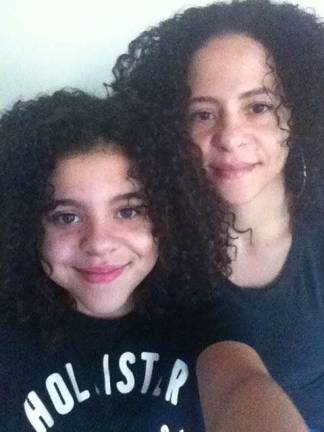 Mother Daughter Look A Like Contest Photo submitted by Jacqueline Caba of Sparta Maya and Jacqueline Caba. "Every where we go people are amazed with our resemblance."