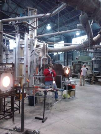 The art of glass blowing Glass blowing in action.