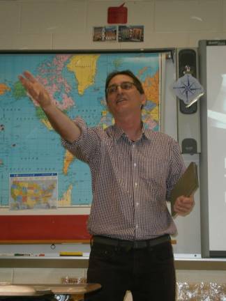'Learn another language,' urges former teacher Kevin Smith guest-lectures about his international teaching experience (Photo provided)