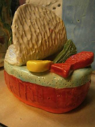 From a lump of clay come many stories Fish basket sculpture by Natalia Liszka
