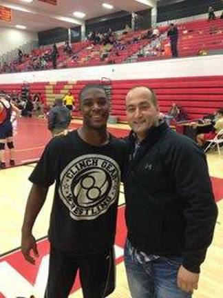 CJ Palmer is college wresting champ Cary "CJ" Palmer with his DV coach, Lou DeLauro (Photo provided)