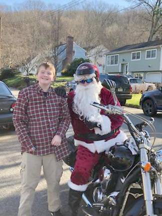 Motorcycle Santa delivers holiday spirit (and candy canes) Dave Green as Santa on his travels around Byram (Photo provided by Dave Green)
