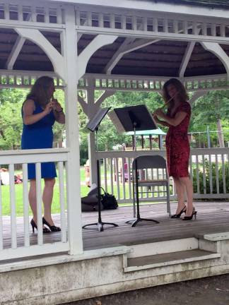 Visitors carve out time for wood fest Performance by Kindred Spirits Arts Program musicians