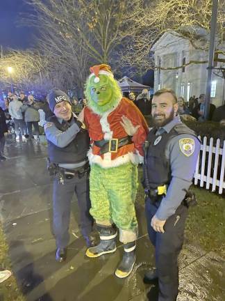 Police Chief Matt McCormick and Officer Brandon Gargan arrested the Grinch.