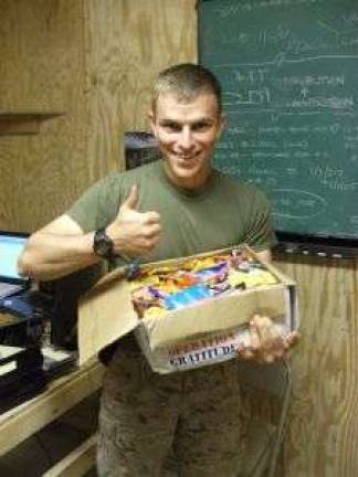 Donate your Halloween candy to the troops A U.S. serviceman receives an Operation Gratitude care package (Photo provided)