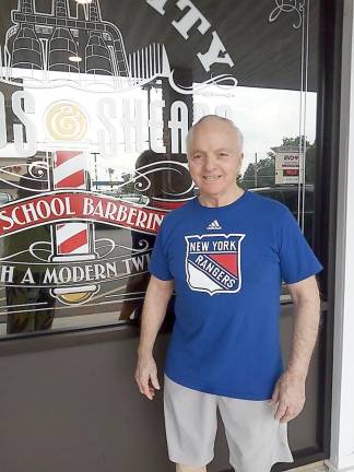 John Curwood, after a shave and a haircut, is pictured near a hotel in Bethlehem, Pa., before flying to Clearwater, Fla., where he will live with his daughter, Joy McCann, and her husband (Photo by Joy McCann)