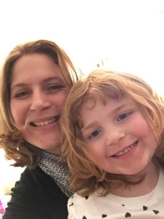 Mother Daughter Look A Like Contest Photo submitted by Sara Scuralli of Newton Sara and her daughter Alexa. "Twinsies! Our similarities go beyond looks."