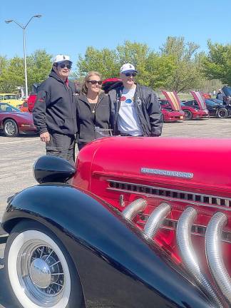 Classic cars, and the people who love them, flock to first cruise From left: Vin DePeppo (Rodfather Gang Car Club adviser), Dr. Mary Jean Negri (owner of Friendly’s of Newton and Wantage which sponsor the event) and Jack Calvert (president of Rodfather Gang) with DePeppo’s Auburn Speedster at Saturday’s 2021 debut cruise (Photo by Laurie Gordon)