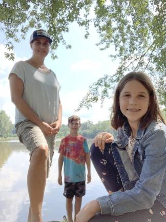 Erica Burnett with her children. She said she's concerned about increasing the flow of waste into the Delaware River (Photo provided)