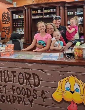 Chrissy Kotar with son Steven Geiger and granddaughters (from left) Avrielle, 12; Hadley, 4; and Savannah, 9, who were visiting from Quantico, Va., where Steven serves with the Marines.