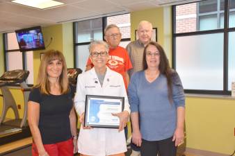 From left: Ann Marie Didato, RN; Nadine Greco, MS; and Diane Shelp, cardiac rehab patient. Back, cardiac rehab patients William Marshall, left, and Walter Tait.